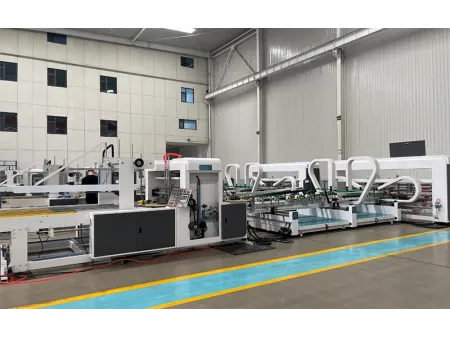 Plieuse-Colleuse Automatique