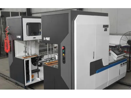 Machine de cerclage pour carton ondulé