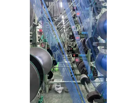 Contrôle actif integré de la tension de la chaîne du cantre d’ourdissage