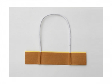 Machine pour la transformation du papier <small>(pour fabrication d'anses de sacs en papier)</small>